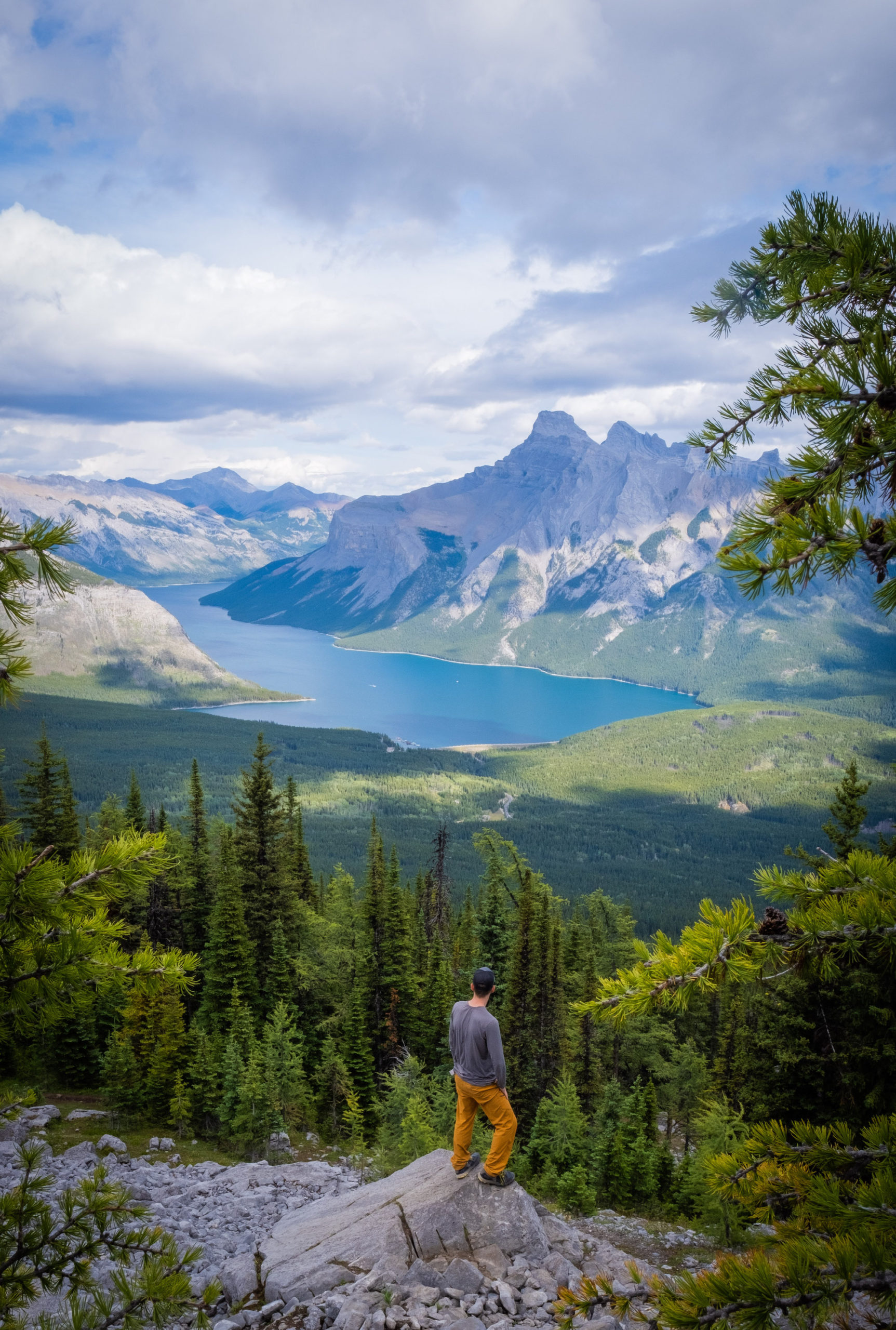 Cameron Stands At Viewpoint From C-Level Cirque With Lake Minnewanka In The Distance