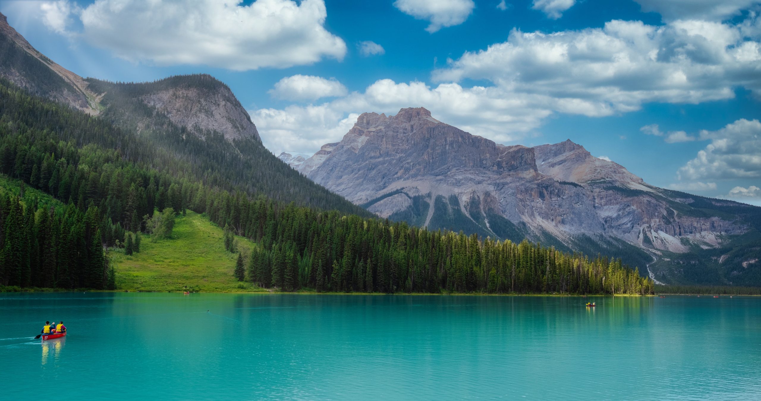 Emerald Lake In The Summer With Canoes