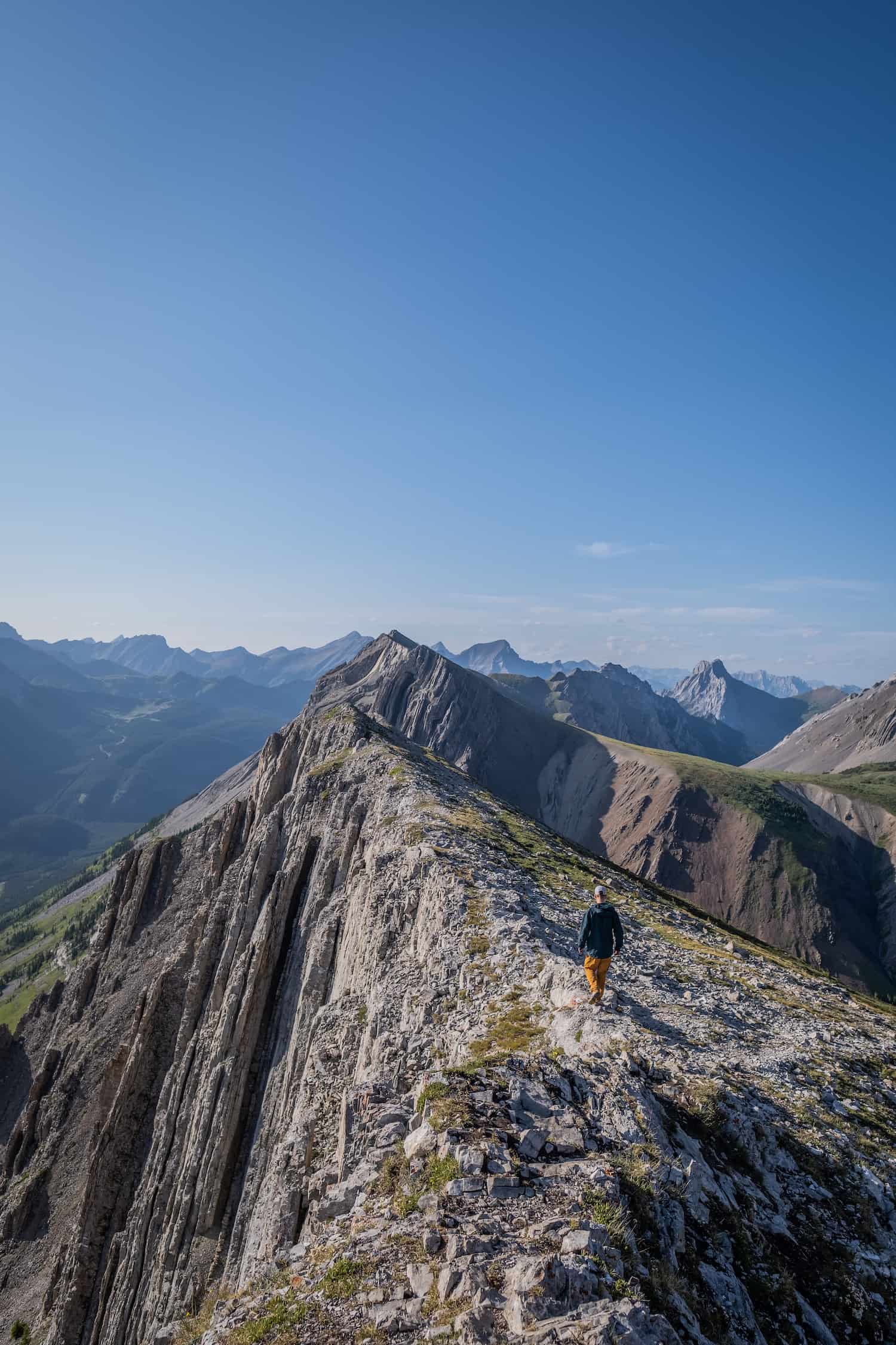 Cameron Walks Along Summit Of Grizzly Peak in Kananaskis