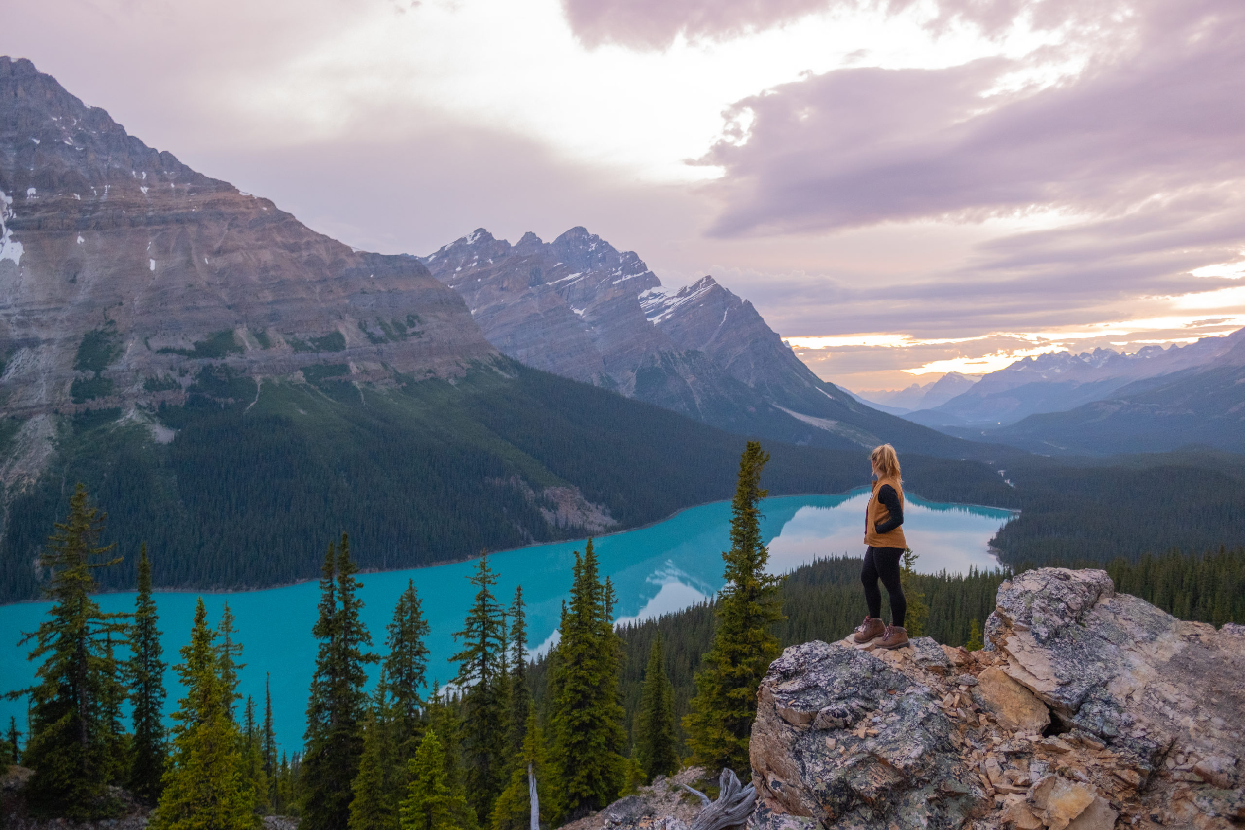 Natasha Stands On Rock Over Peyto Lake From Bow Summit