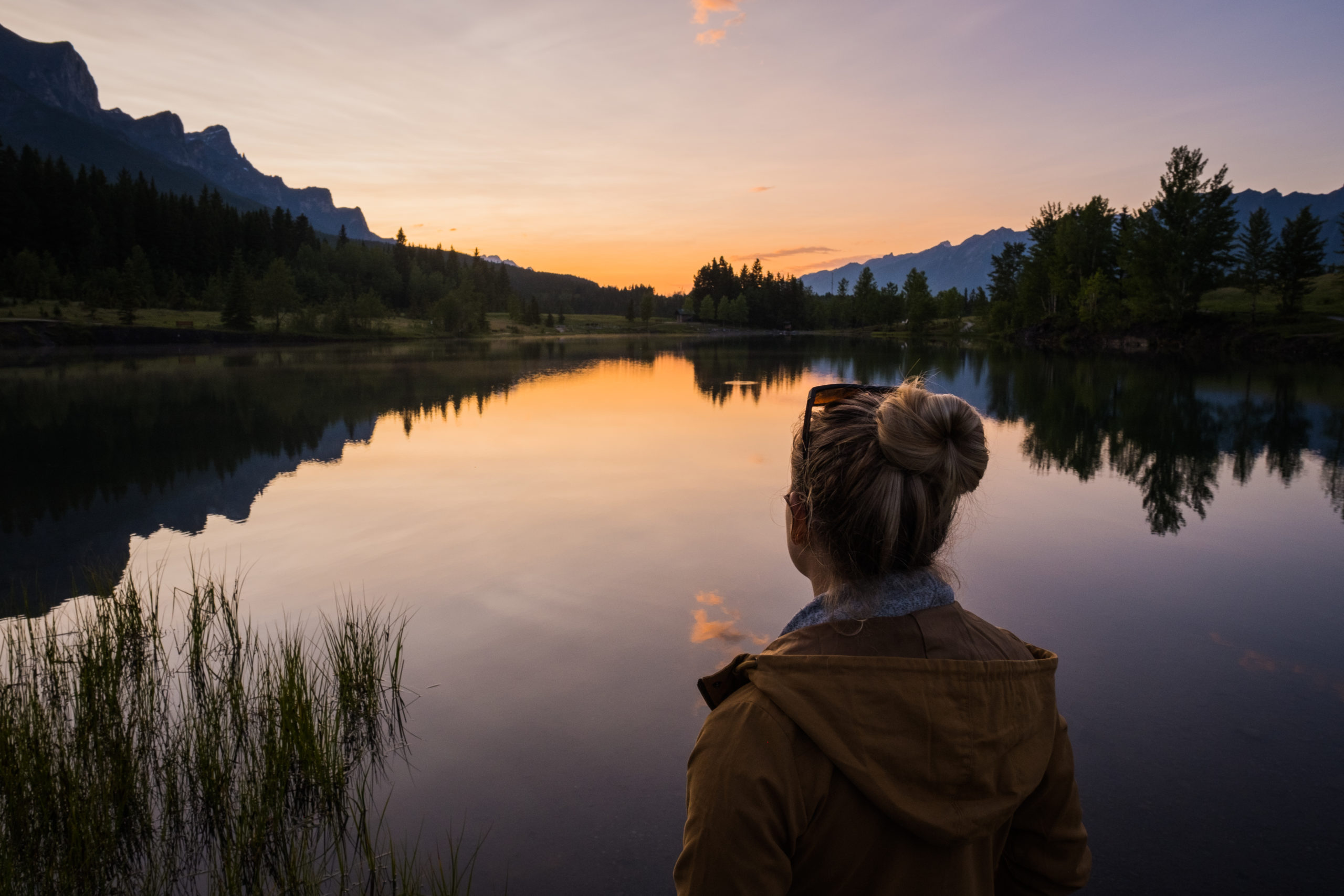 Natasha Looks Over Quarry Lake At Sunset