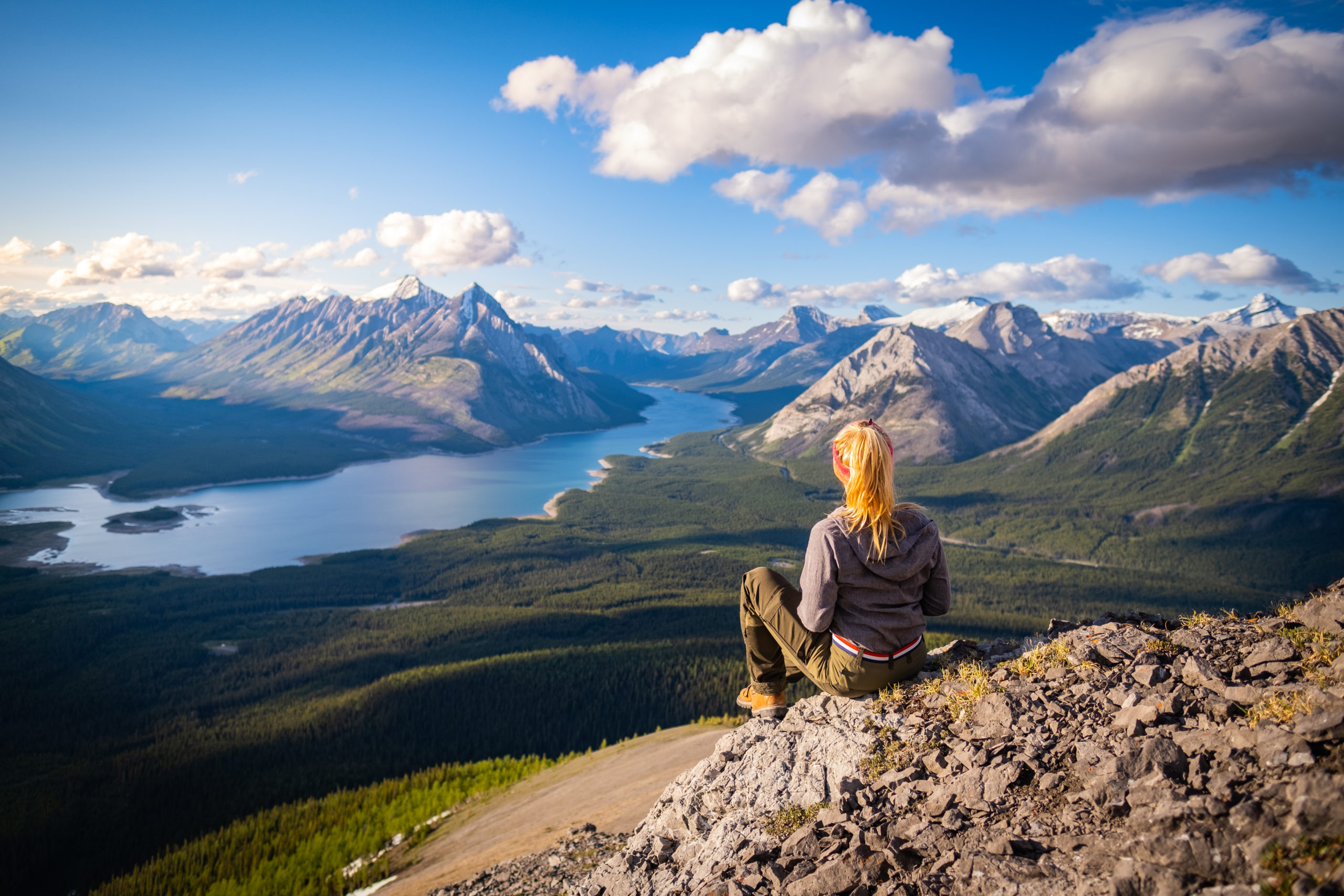 Natasha Sits At The End Of Tent Ridge At Sunset