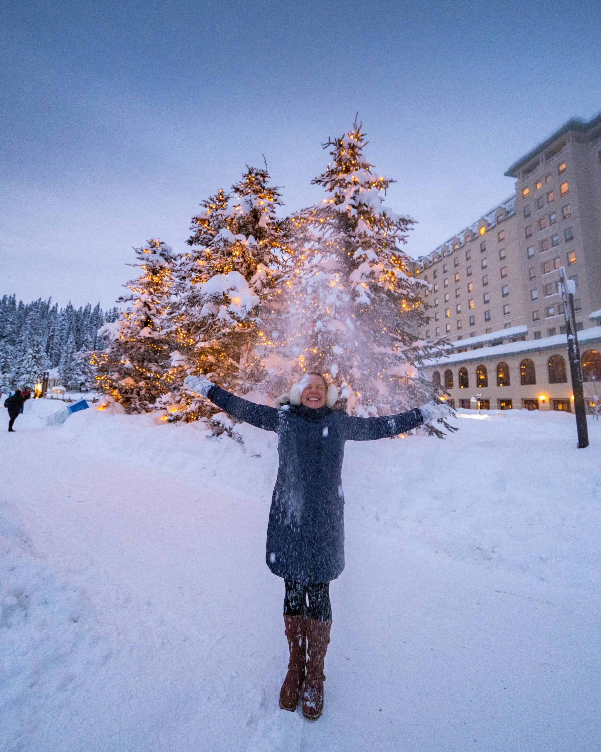 Natasha Throws Snow Up In Front of Chateau Fairmont Lake Louise