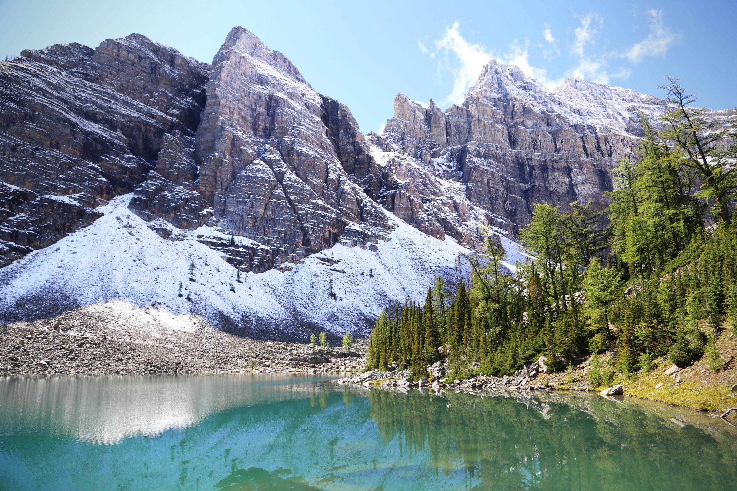 Looking up at Devil's Thumb from Lake Agnes