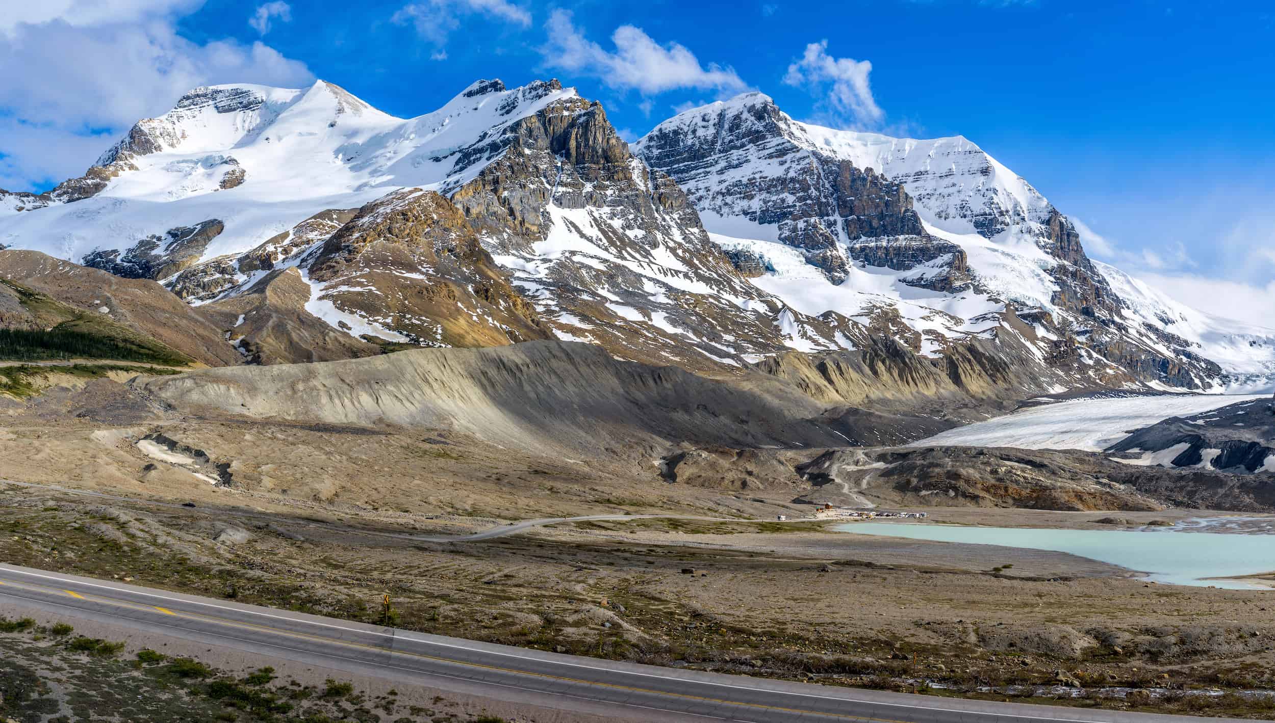 Mount Athabasca and Andromeda With The Icefields Parkway In Foreground