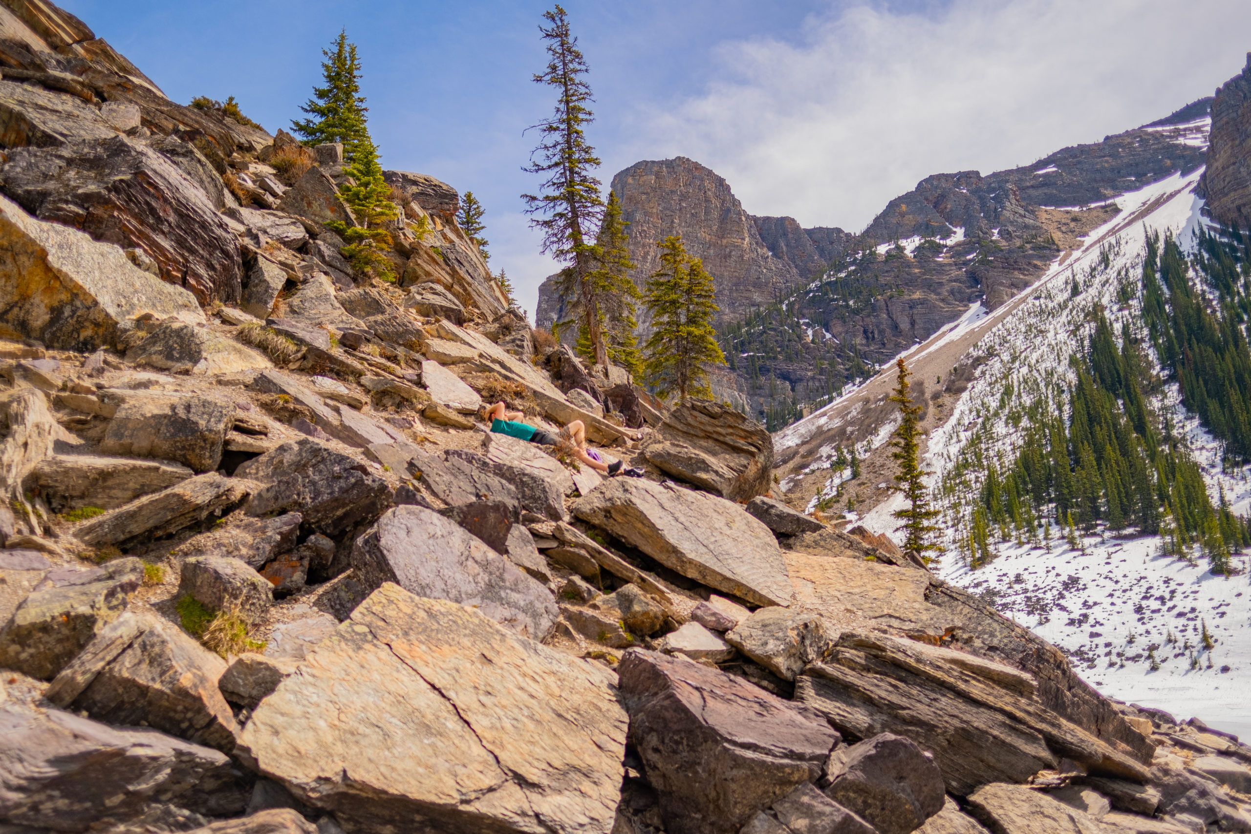 Cameron Relaxes on the Rock pile trail at Moraine Lake