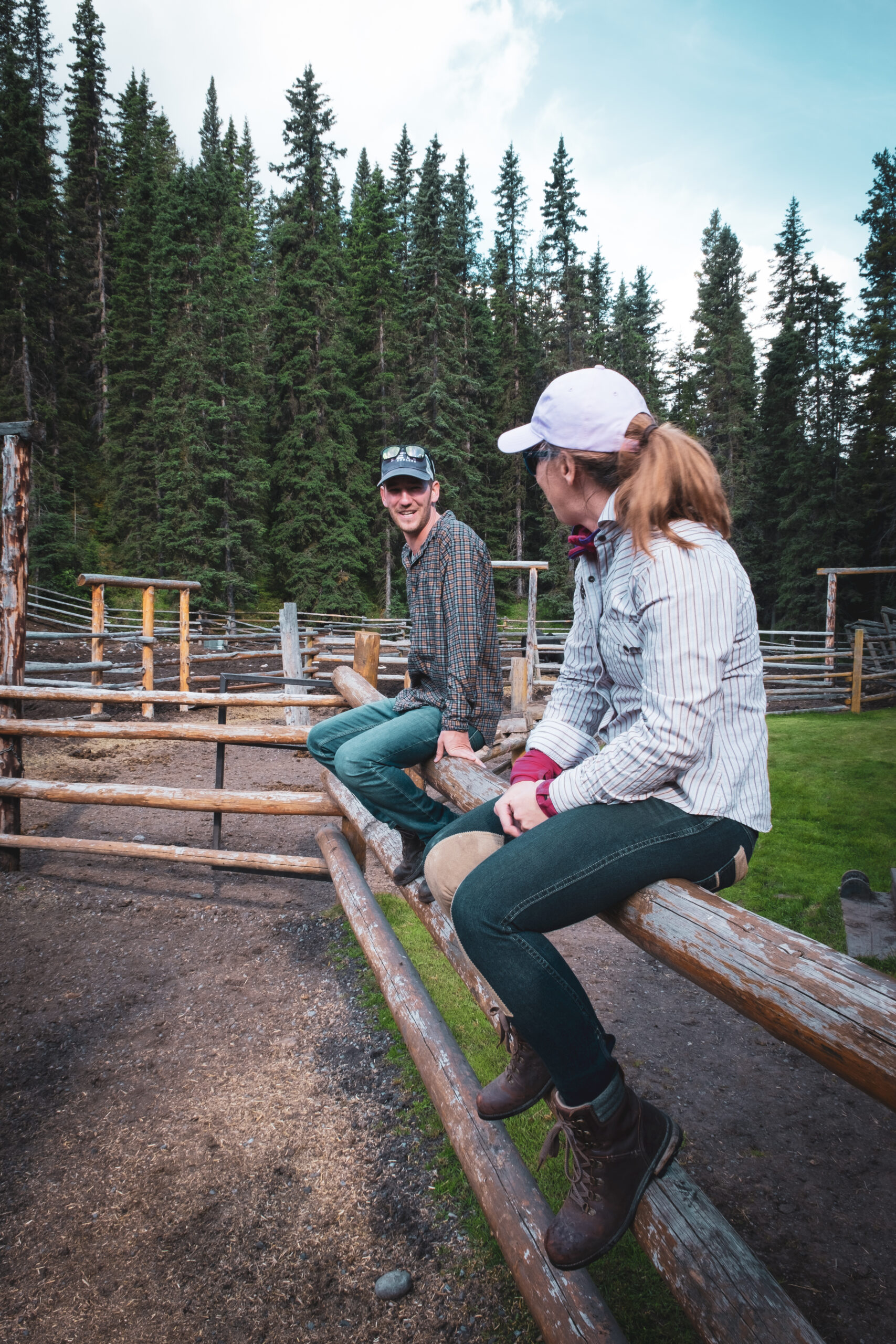 Cameron Sits On Railing Before Horseback Ride