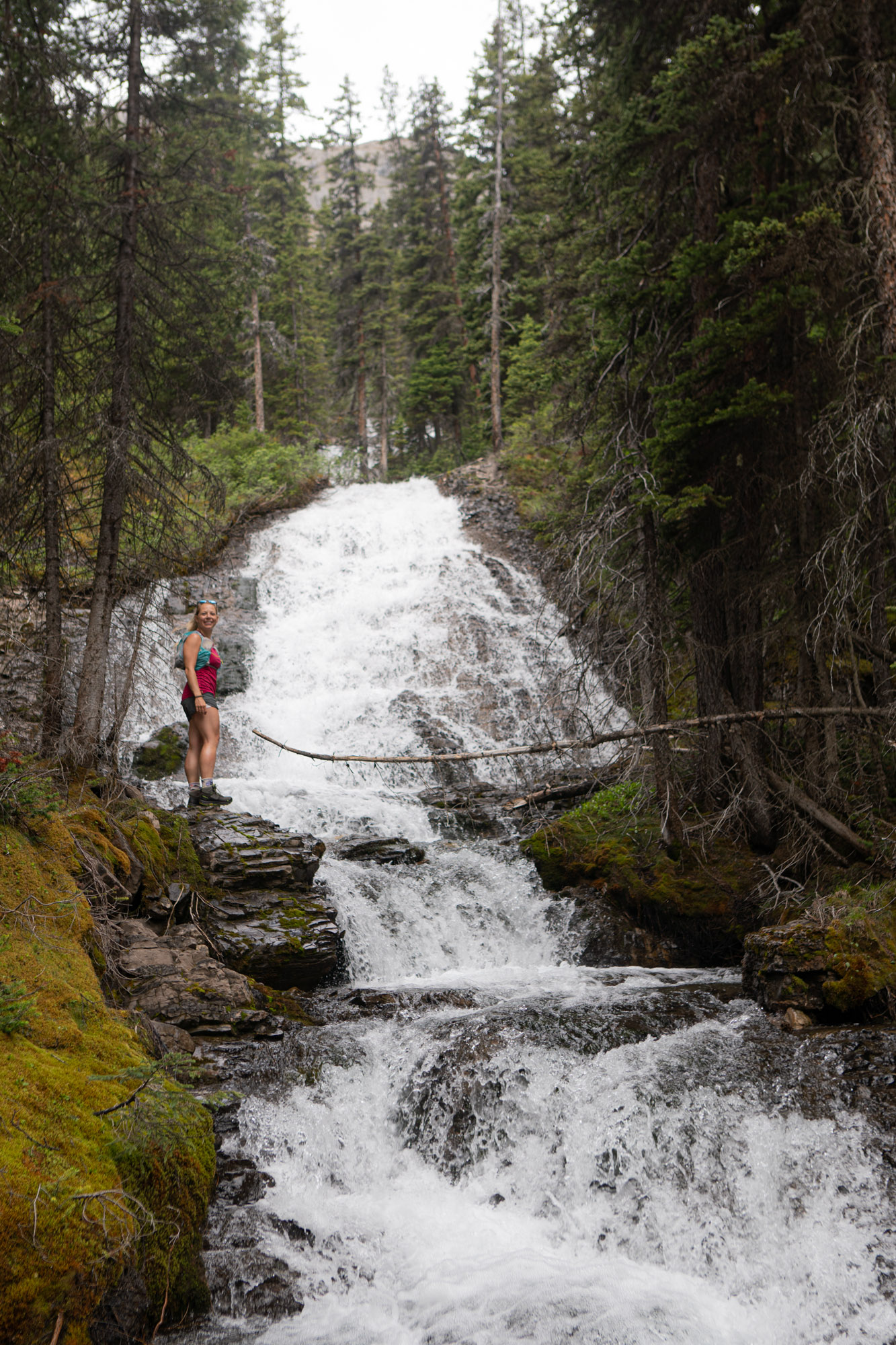 Natasha Along Waterfall In Backcountry