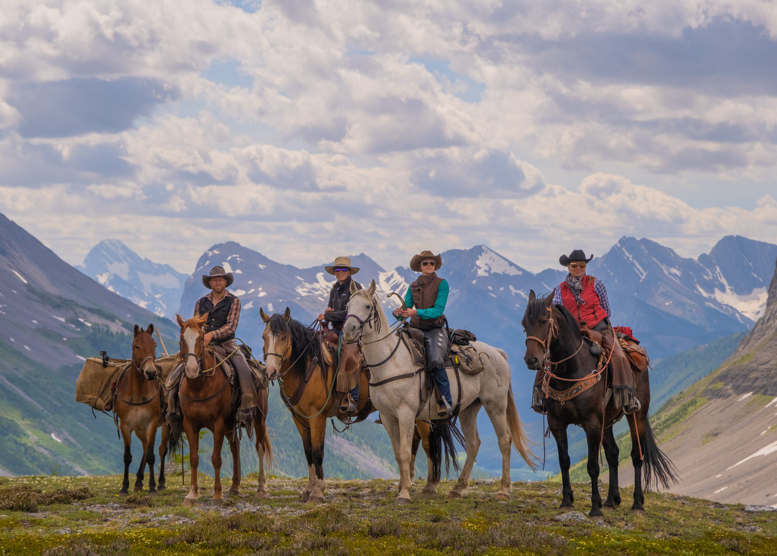 The Employees Of Banff Trail Riders Mounted On Hoseback At Top Of Allenby Pass