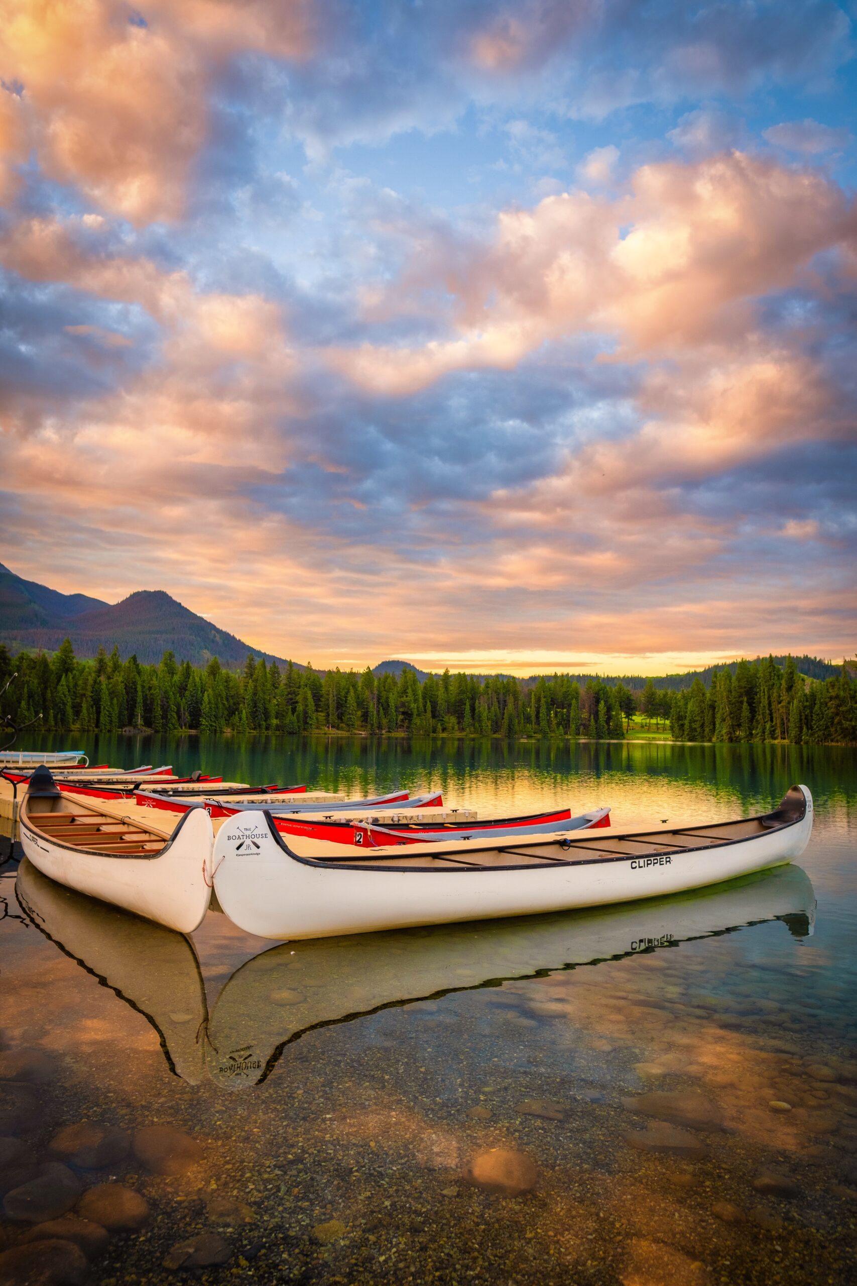 canoes on Lake Beauvert in jasper