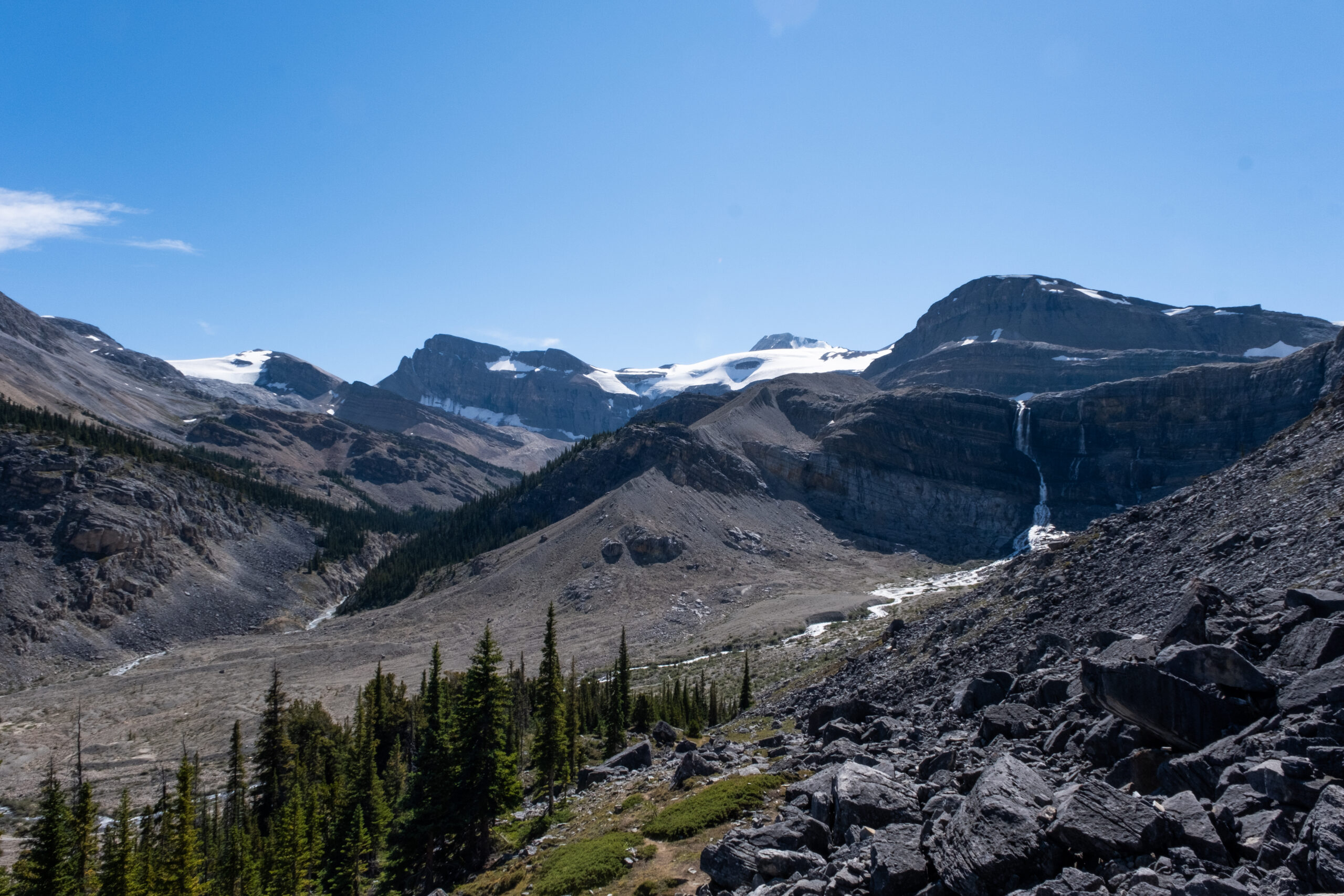 Take a look back at Bow Glacier Falls as you start to ascend
