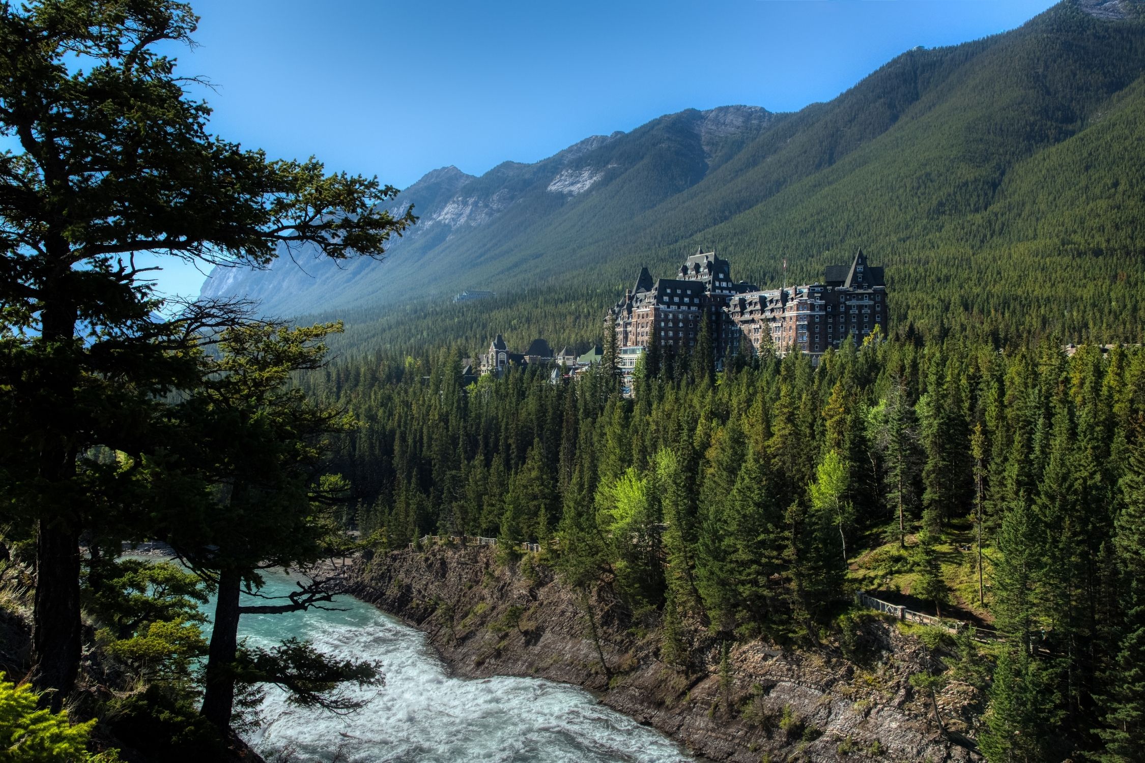 The Banff Springs Hotel Stands Over Bow River