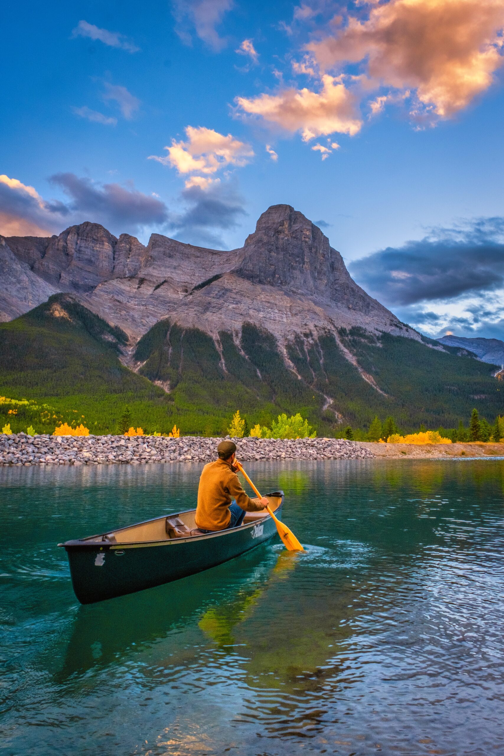 Cameron Paddles Along The Canmore Rundle Fore Bay Reservoir