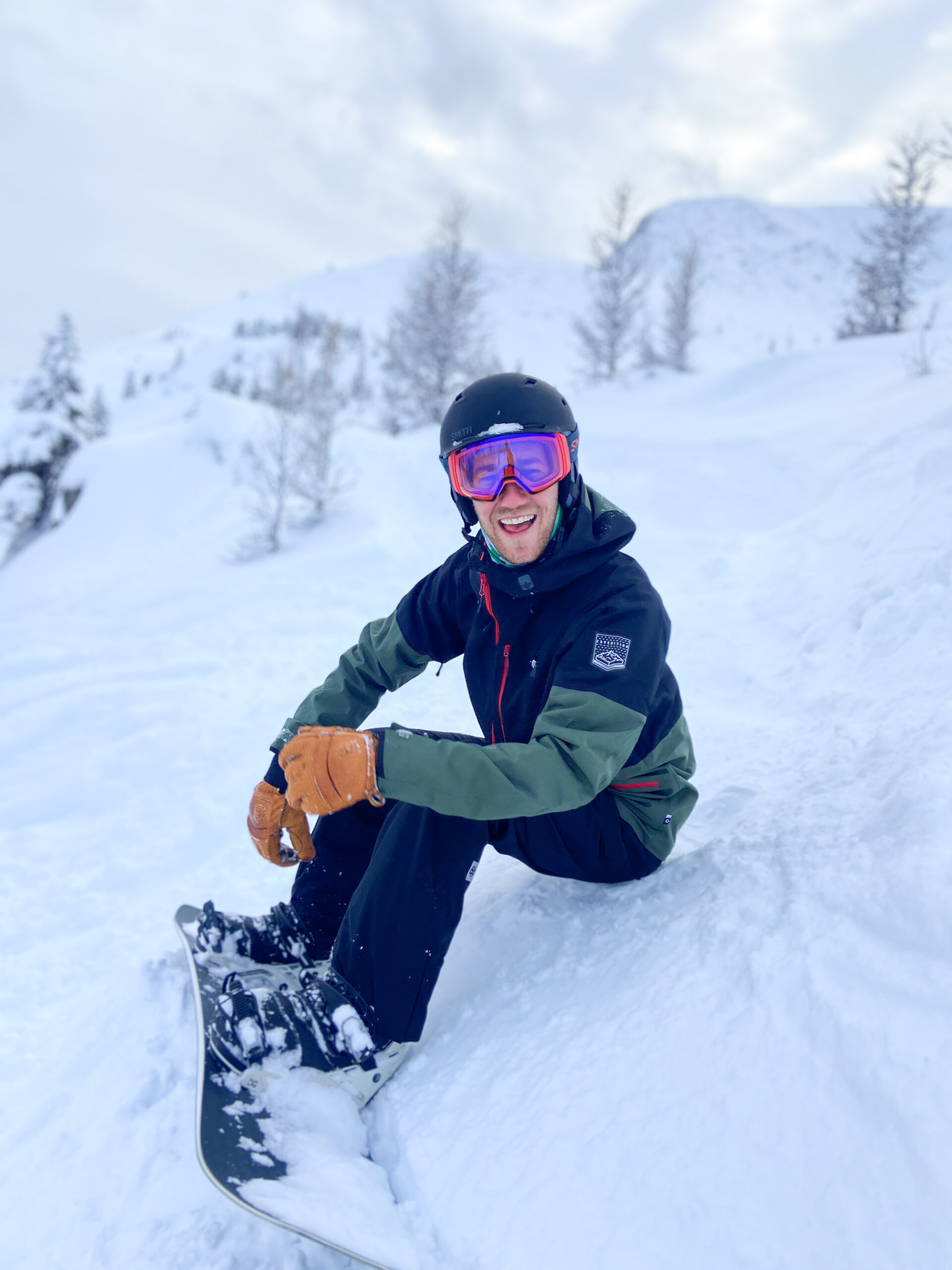 Cameron Sits Down After A Powder Run At Lake Louise Ski Resort In The West Bowl