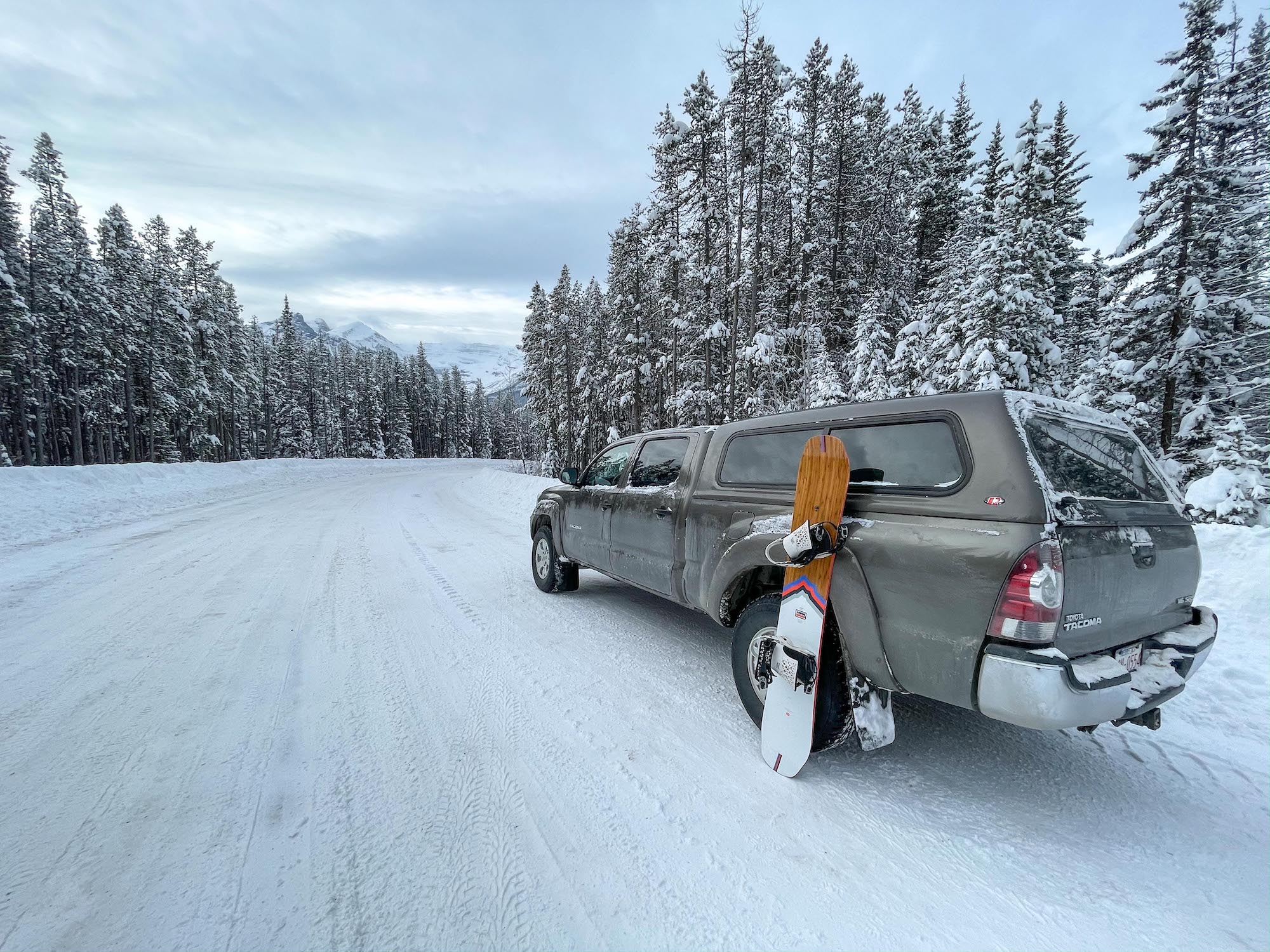 Skoki Parking Lot With Truck and Snowboard