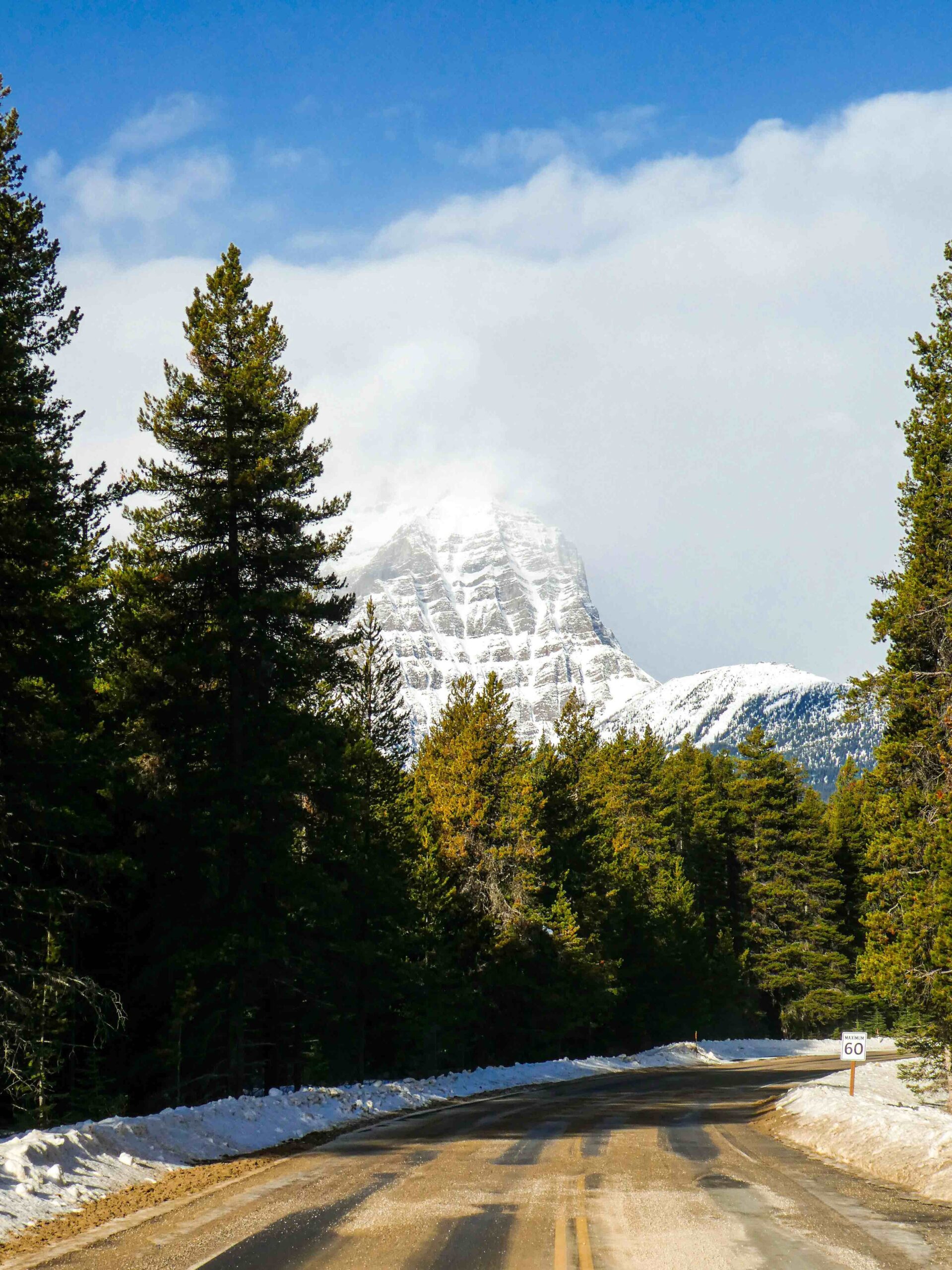 Mt. Temple amidst the clouds - the view from the road in front of Baker Creek