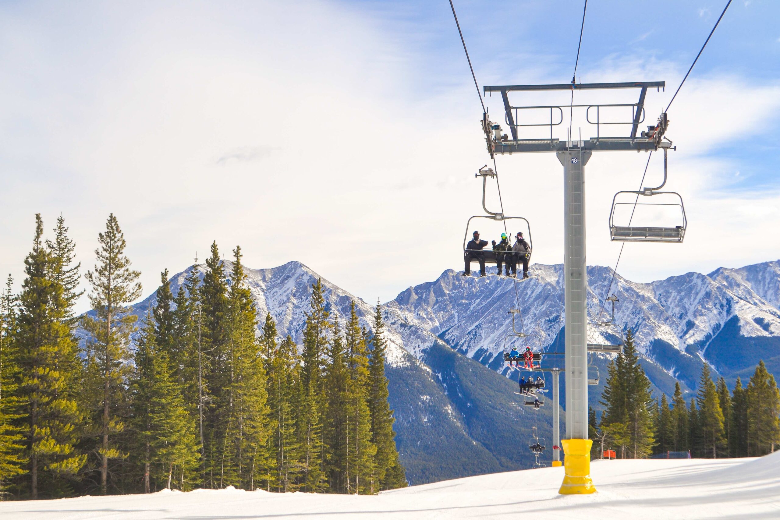 The Nakiska Ski Resort in Kananaskis - the Silver Chairlift with the stunning mountain landscape in the distance