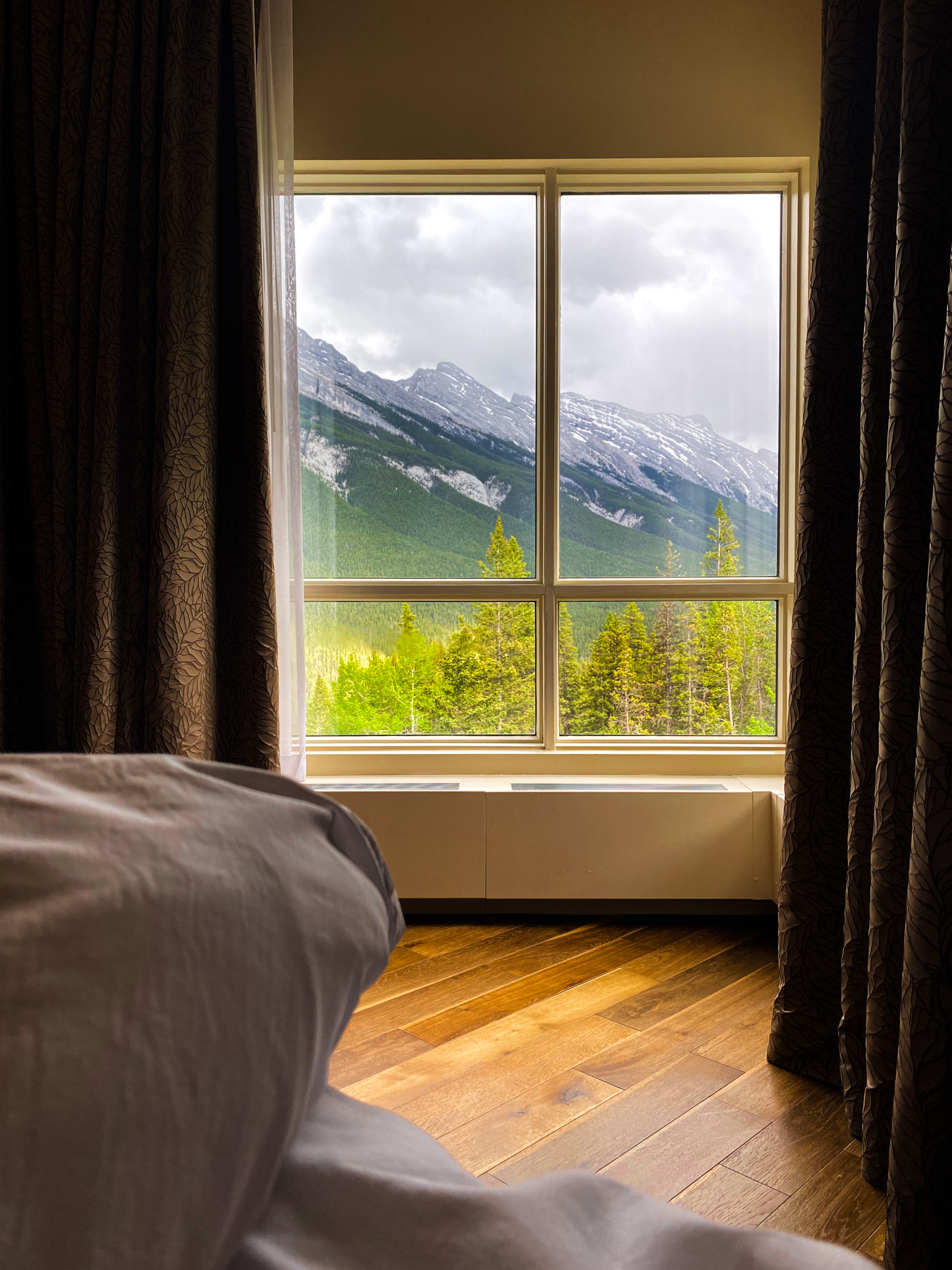 Enjoying the views of Mount Rundle from the comfort of our King bed at the rimrock
