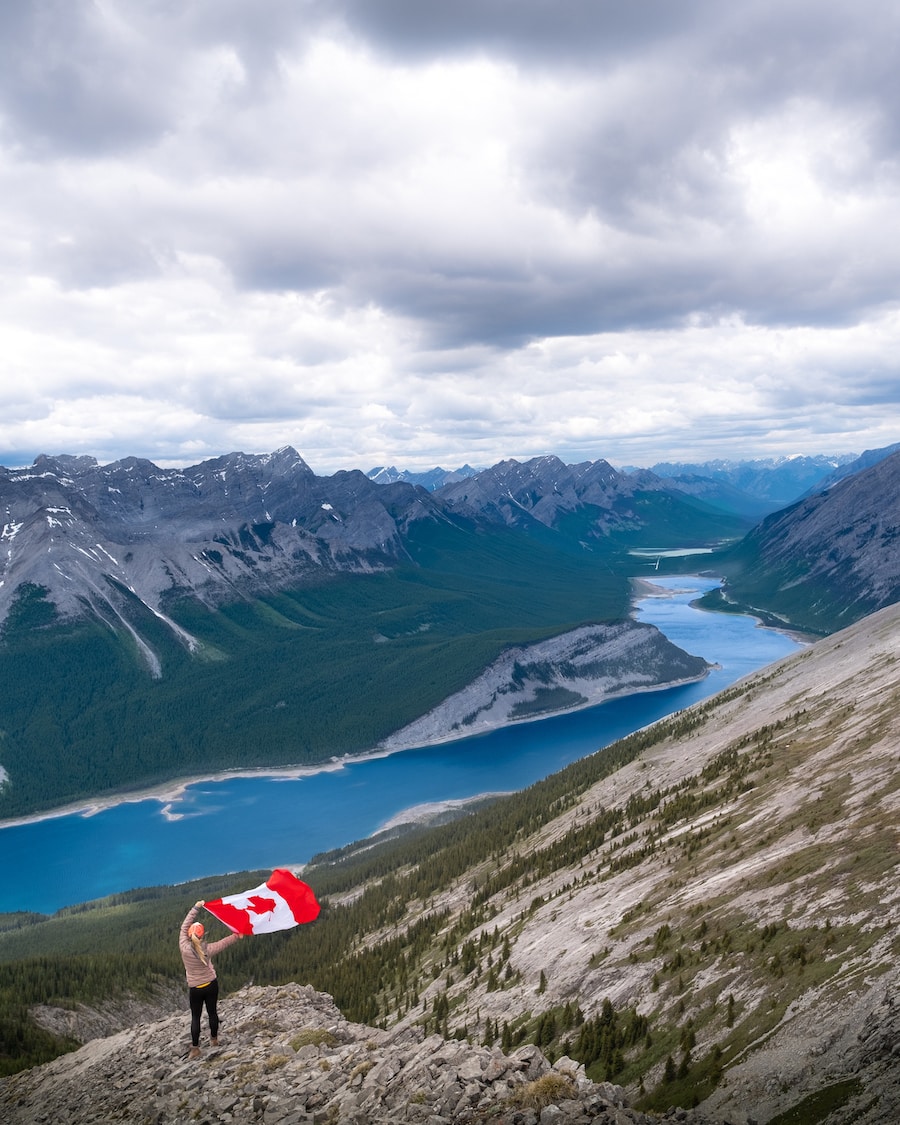 Natasha Holds Up Canadian Flag On Reads Tower