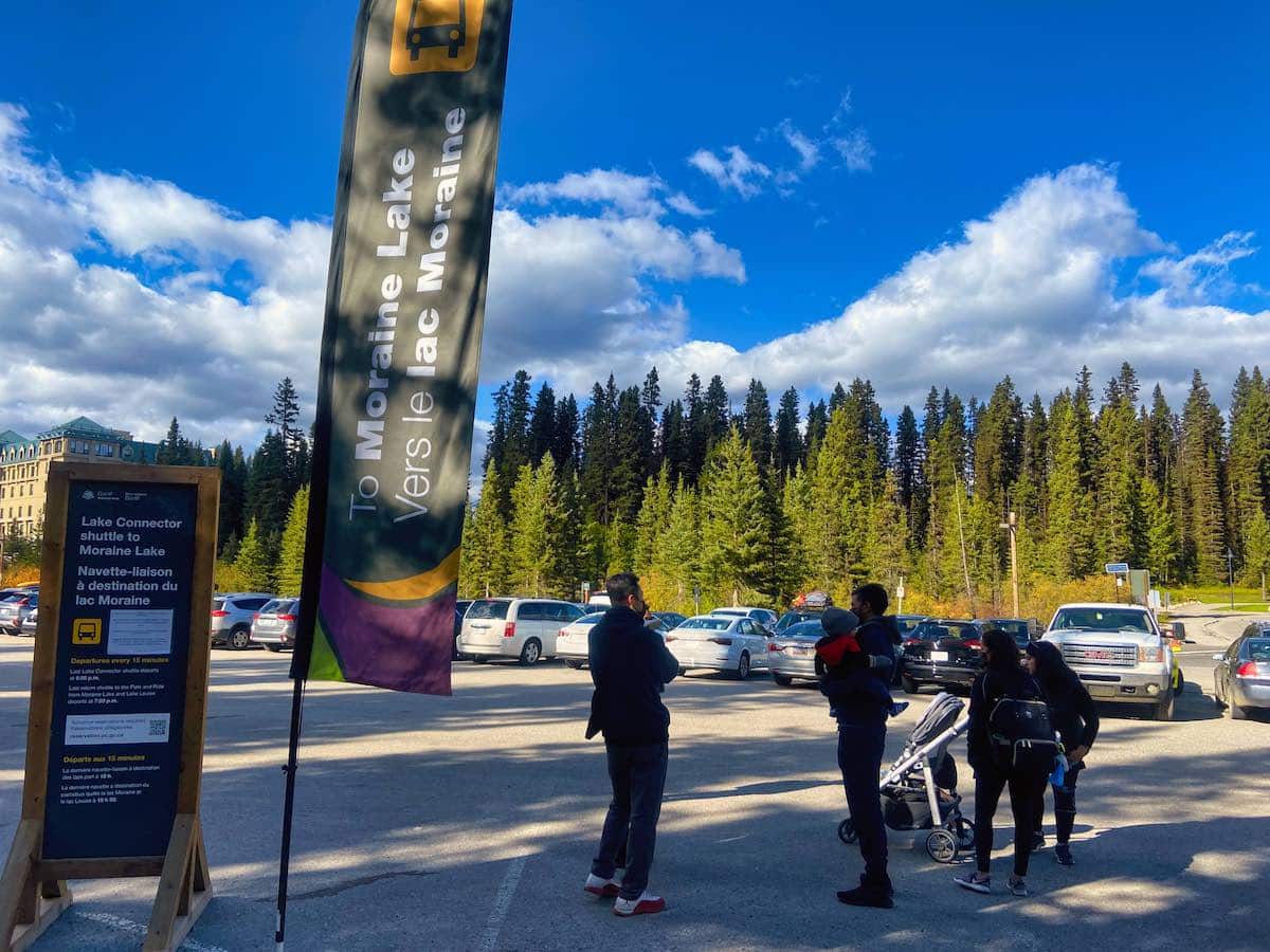 Visitors Waiting For The Lake Connector Shuttle Bus At Lake Louise