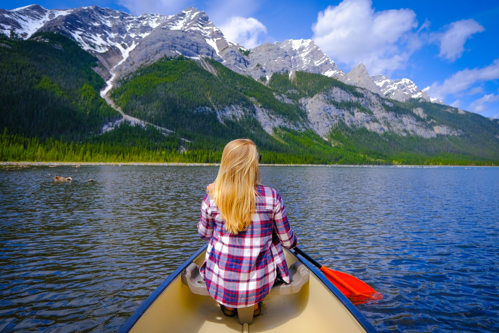 canoeing on goat pond in kananaskis