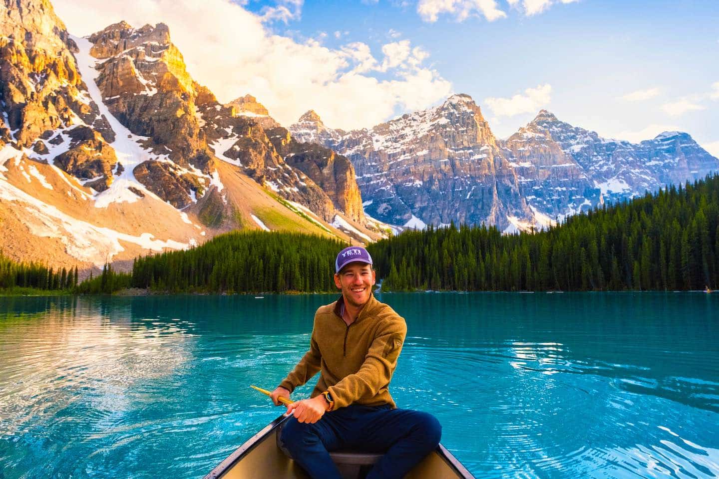 Cameron paddling a canoe on Moraine Lake