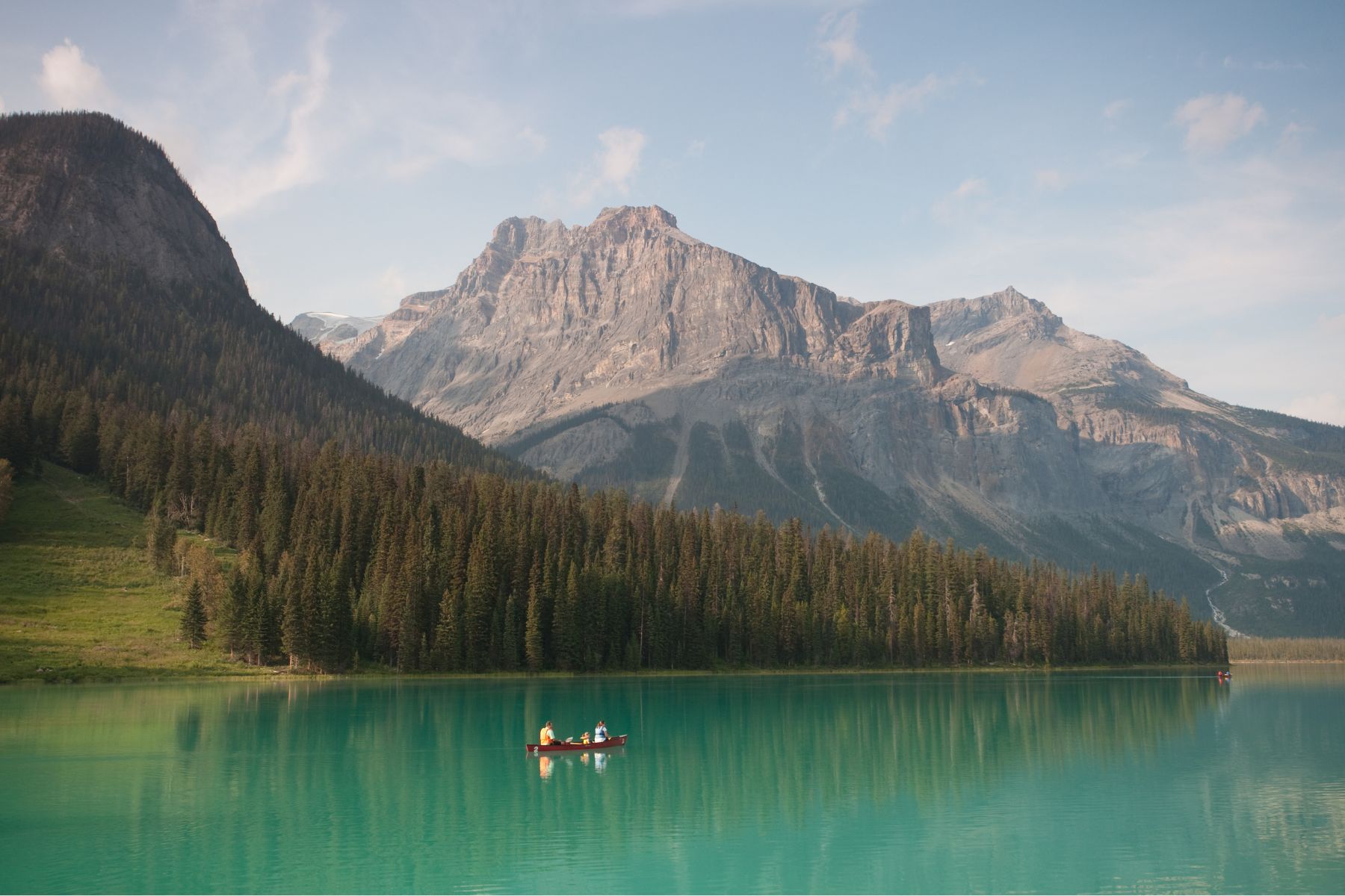 Sole Paddlers In Canoe On Emerald Lake