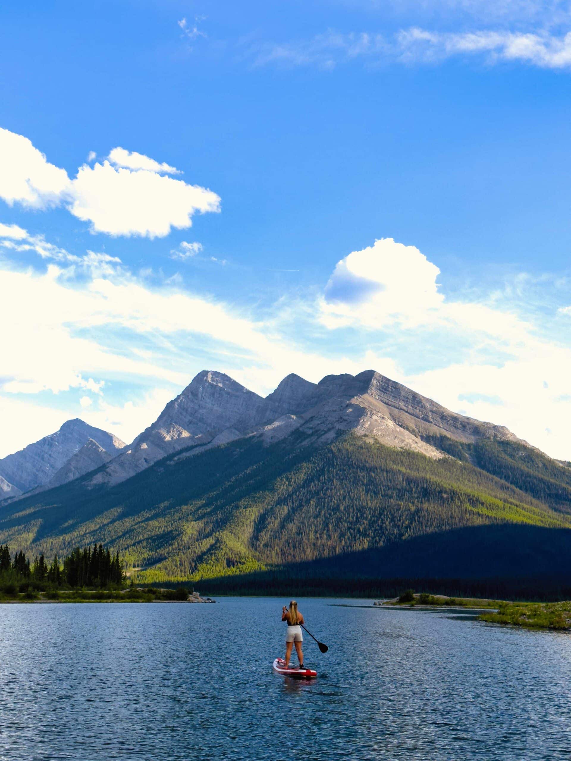 Natasha paddleboarding on Goat pond