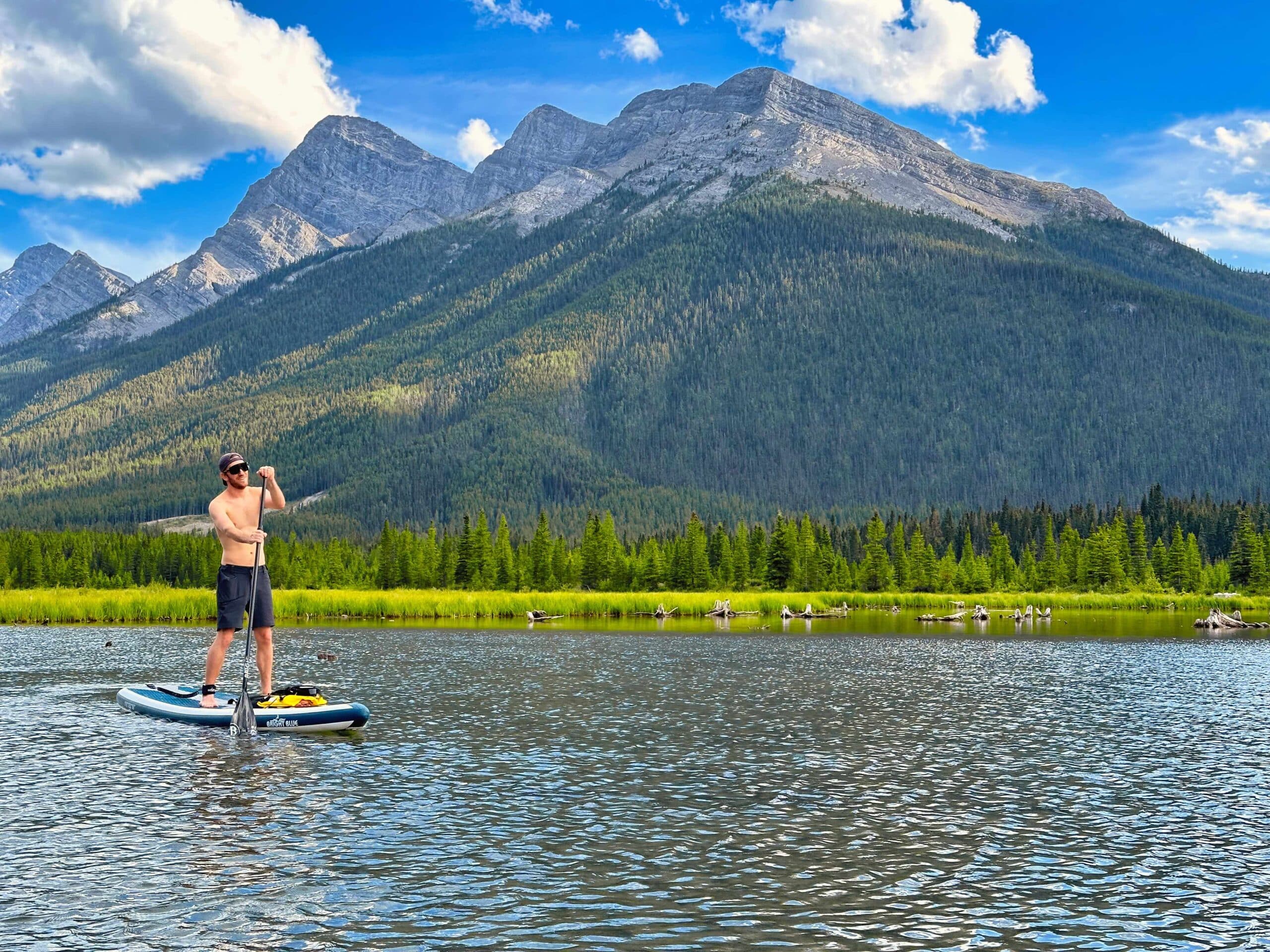 stand up paddleboarding on goat pond canmore