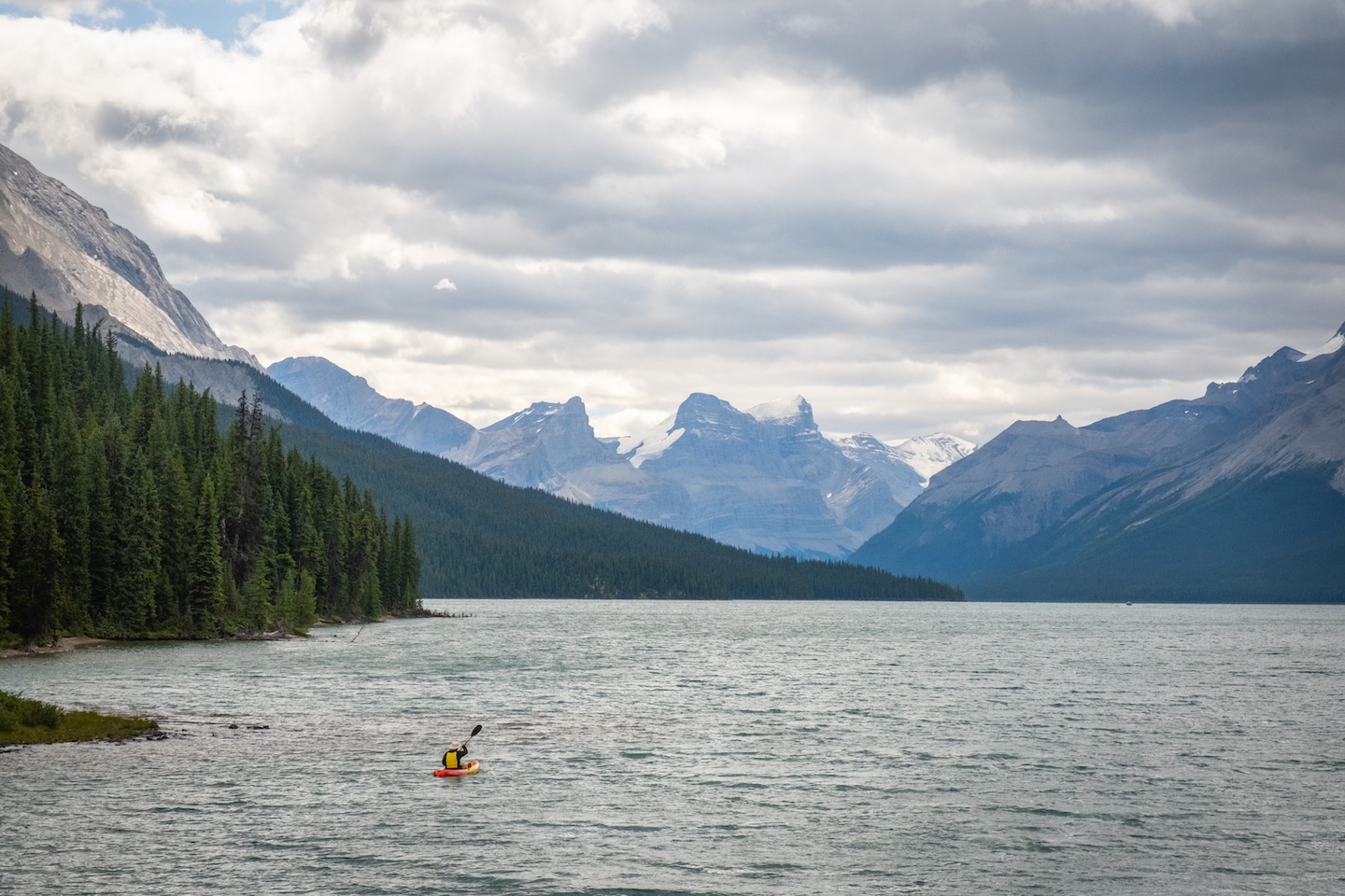 A kayaker on Maligne Lake