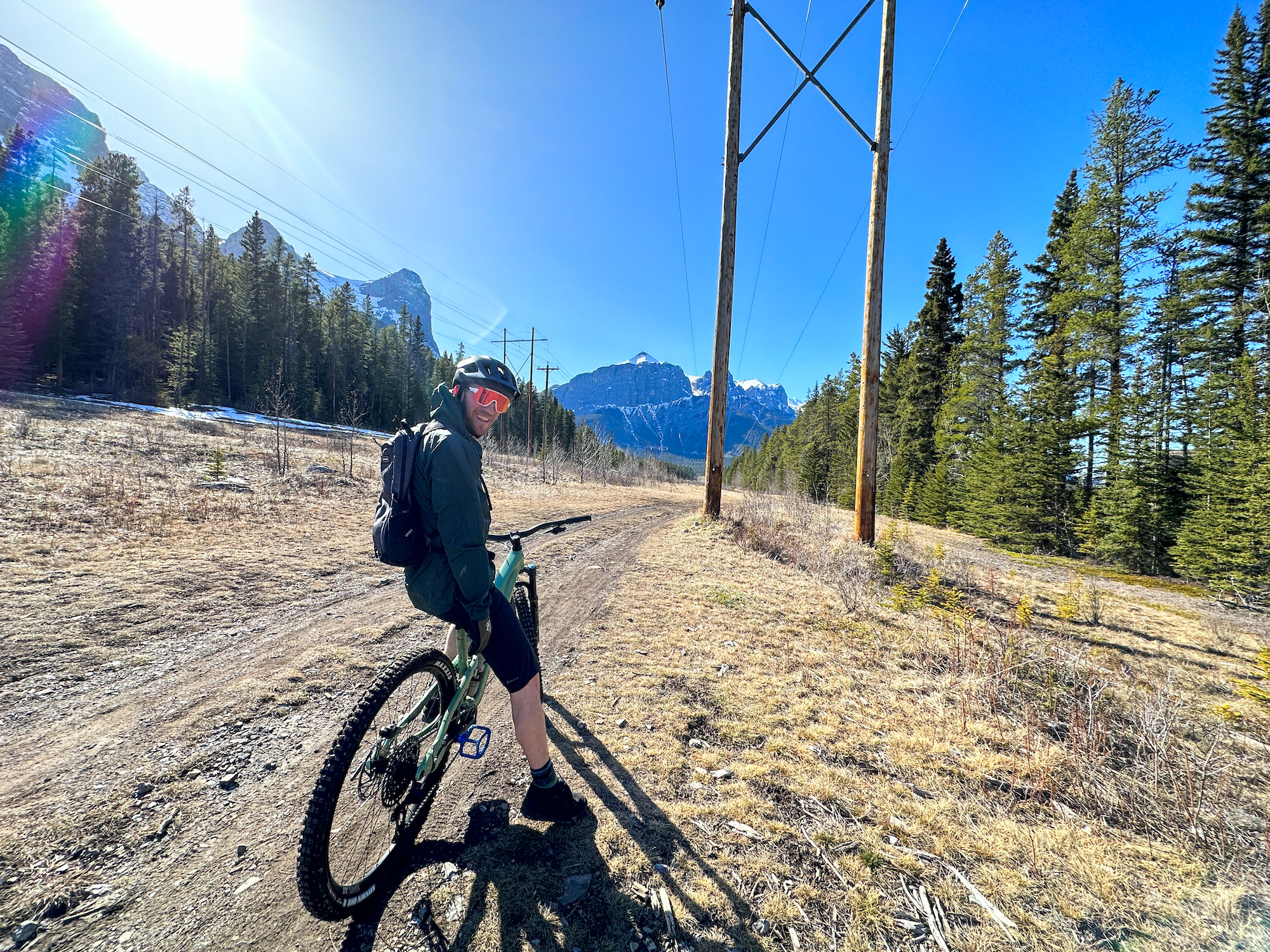 cameron riding his bike on the Powerline Trail in canmore