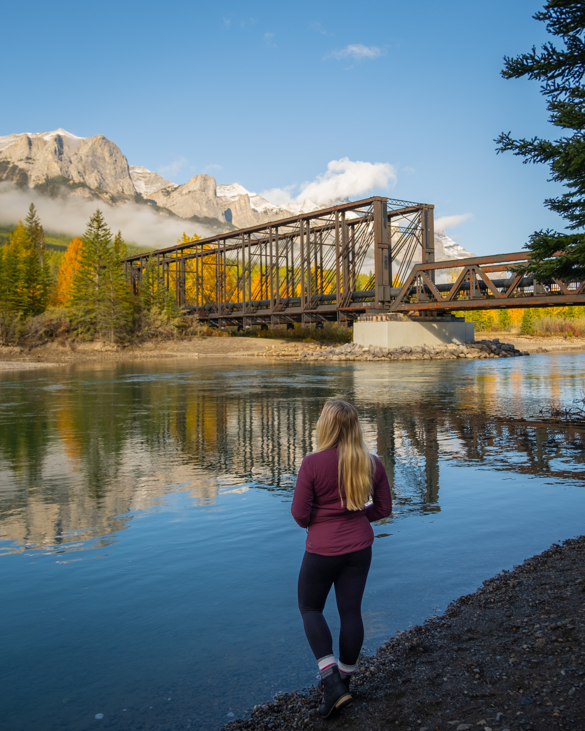 Natasha Looks Out To Engine Bridge In Canmore On Bow River
